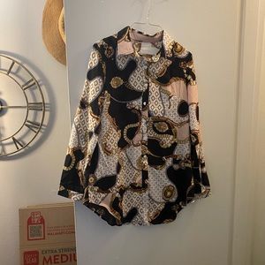 Woman’s long sleeve blouse. Never worn. Small.